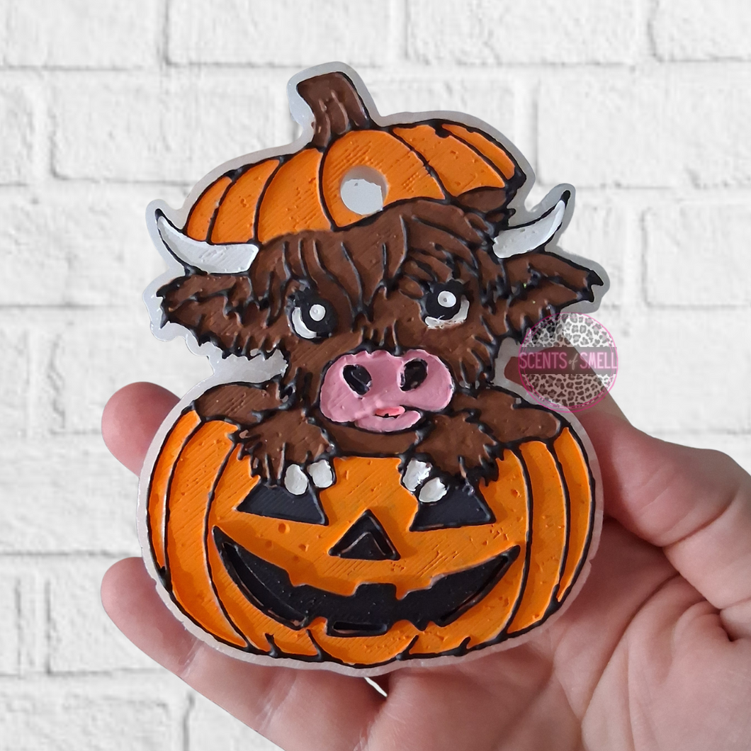 Highland Cow In Pumpkin